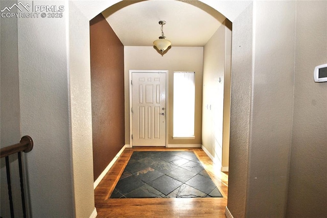 foyer entrance featuring hardwood / wood-style floors