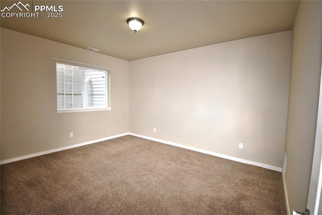 view of carpeted spare room