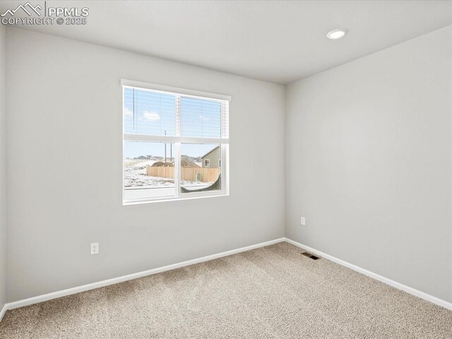 10434 Devoncove Dr, Peyton, CO 80831 - carpeted empty room with visible vents and baseboards