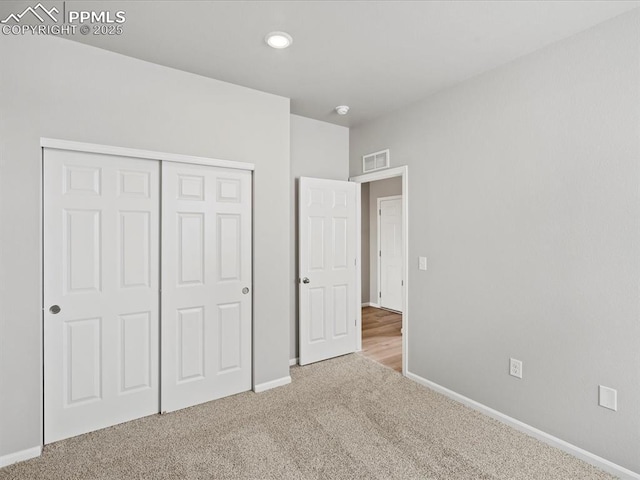 10434 Devoncove Dr, Peyton, CO 80831 - unfurnished bedroom featuring carpet flooring, baseboards, visible vents, and a closet
