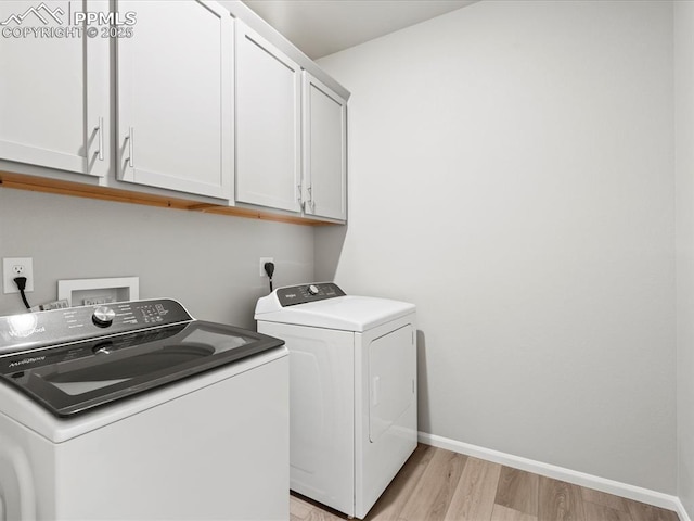 10434 Devoncove Dr, Peyton, CO 80831 - washroom with washer and dryer, baseboards, cabinet space, and light wood-style floors