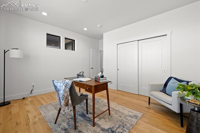 home office featuring light hardwood / wood-style flooring