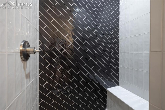 bathroom featuring tiled shower