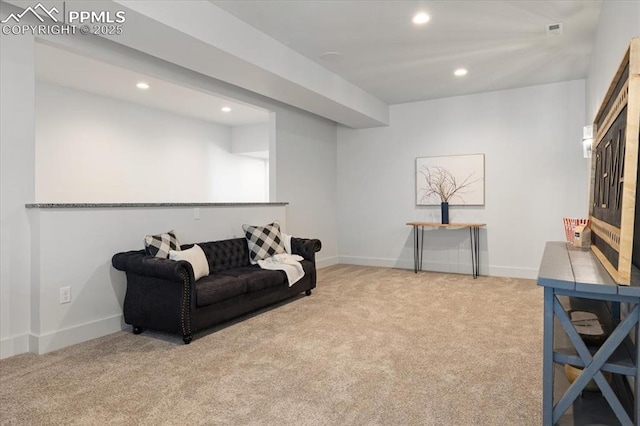 living room featuring light colored carpet