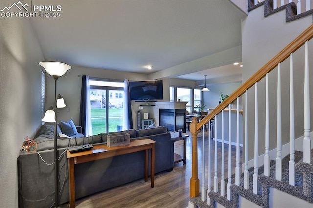 living room featuring hardwood / wood-style flooring and a wealth of natural light