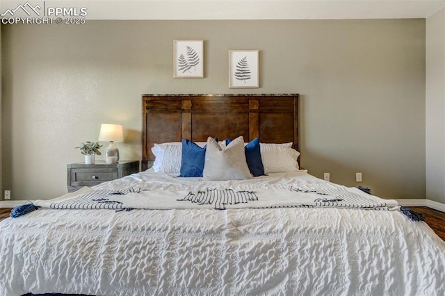 bedroom featuring wood-type flooring