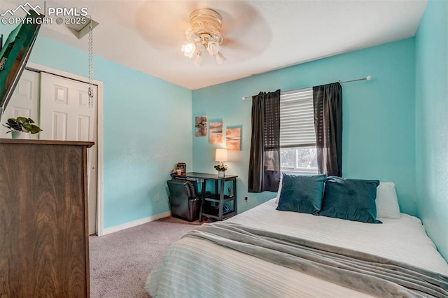 bedroom with ceiling fan, a closet, and carpet