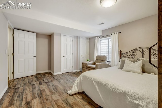 bedroom with wood-type flooring