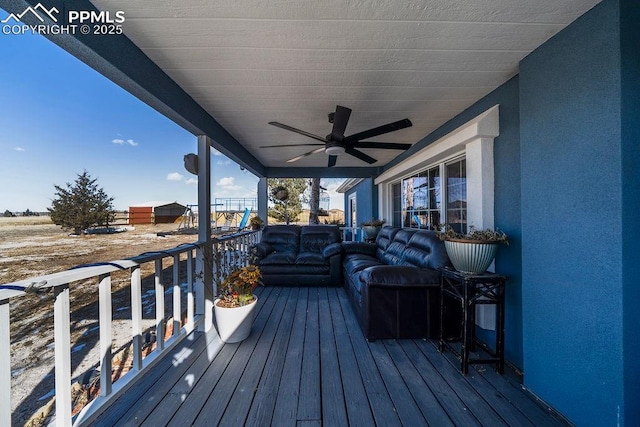 deck with ceiling fan and an outdoor hangout area