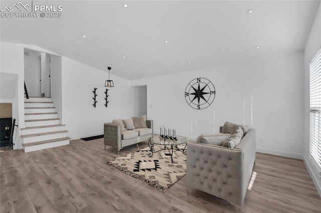 living room with light hardwood / wood-style floors