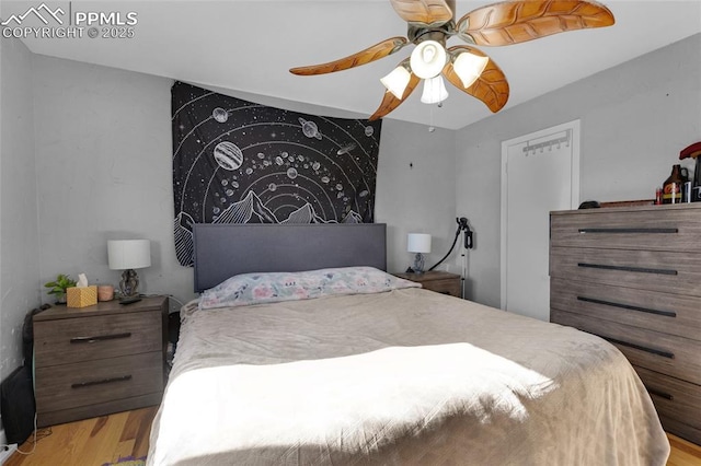 bedroom featuring ceiling fan and light wood-type flooring