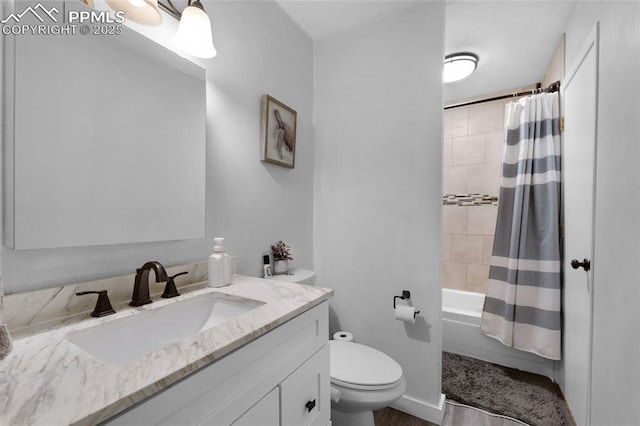 full bathroom featuring toilet, vanity, and shower / bath combo