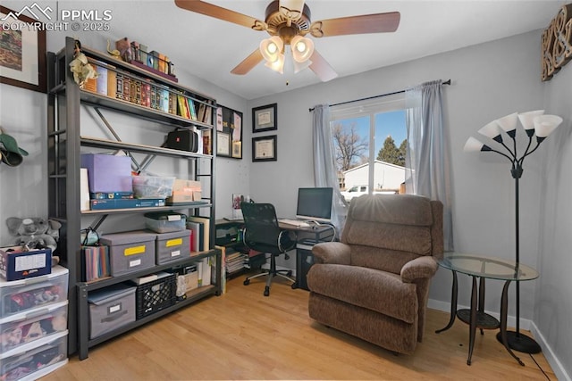 office featuring ceiling fan and light hardwood / wood-style floors