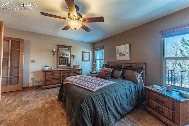 bedroom featuring ceiling fan