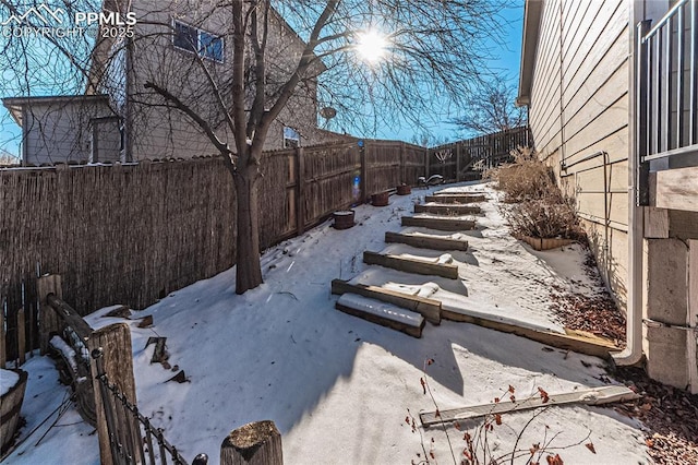 view of yard covered in snow