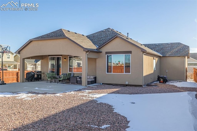 view of front of property with a patio area