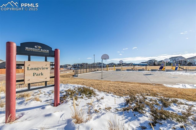 surrounding community featuring basketball court