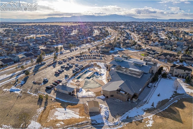 birds eye view of property featuring a mountain view