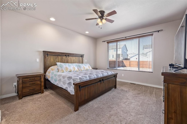 bedroom featuring ceiling fan and light colored carpet