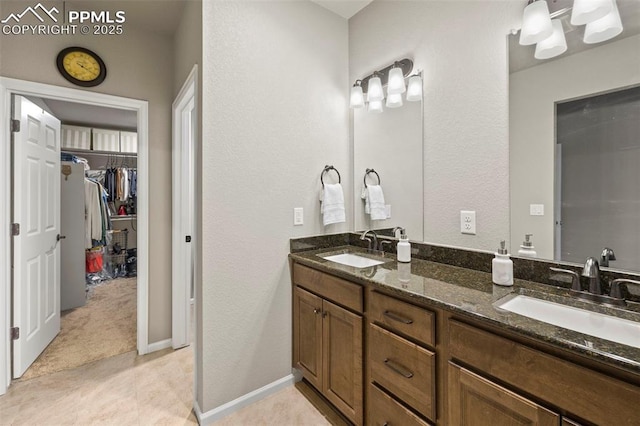 bathroom with vanity and tile patterned floors