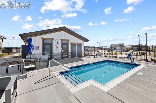 view of swimming pool featuring a patio area