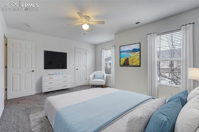 carpeted bedroom with ceiling fan