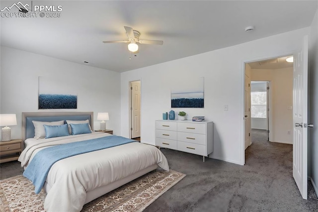 bedroom featuring dark colored carpet and ceiling fan