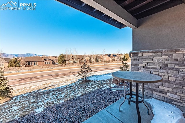 view of patio / terrace featuring a mountain view