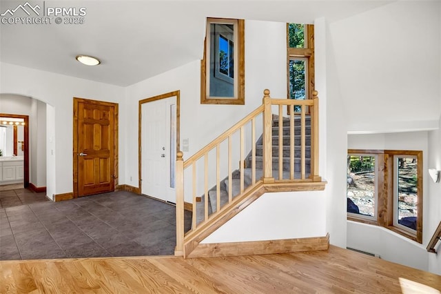 foyer with dark wood-type flooring