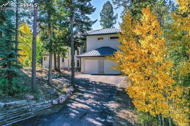 view of front of home with a garage