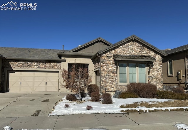 view of front of property with a garage