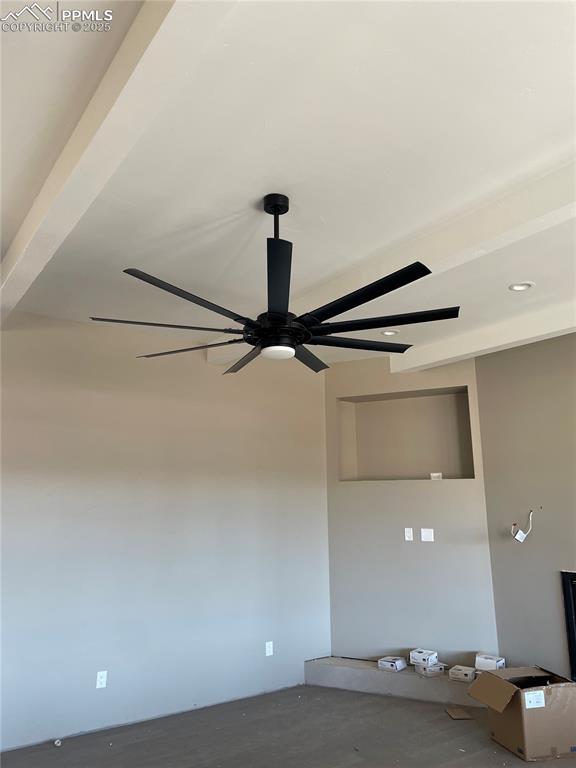 unfurnished room with ceiling fan