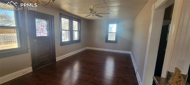 entryway featuring ceiling fan and dark hardwood / wood-style floors