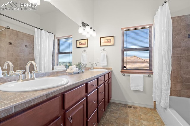 bathroom with vanity and shower / tub combo with curtain