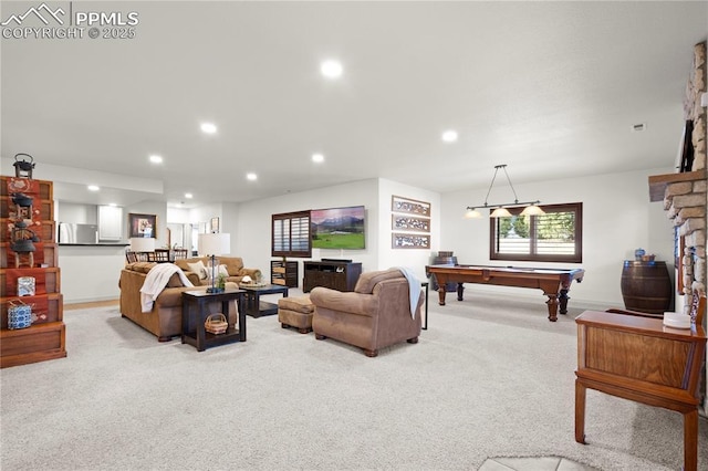 living room featuring light carpet and billiards