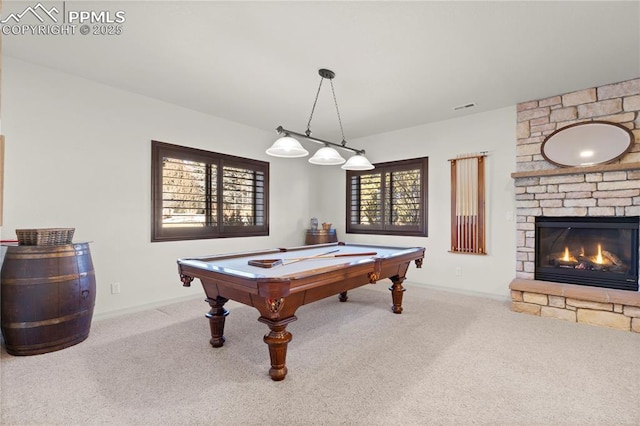 playroom featuring carpet, billiards, and a stone fireplace