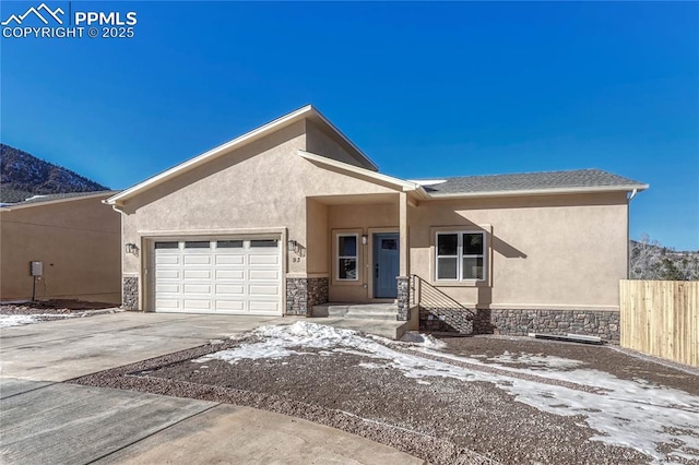 view of front of property featuring a garage