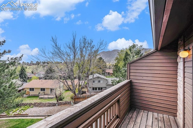 balcony featuring a mountain view