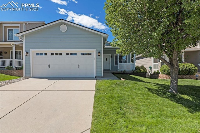 view of front facade featuring a front lawn, covered porch, and a garage