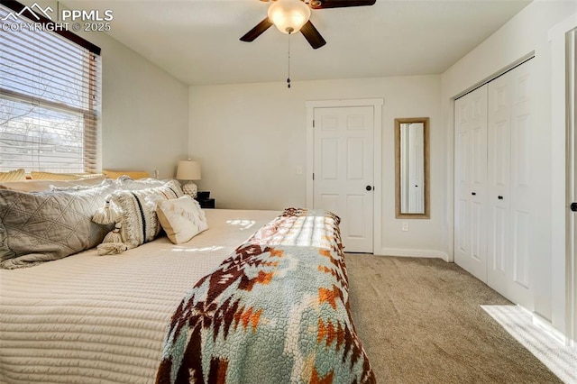 carpeted bedroom with ceiling fan