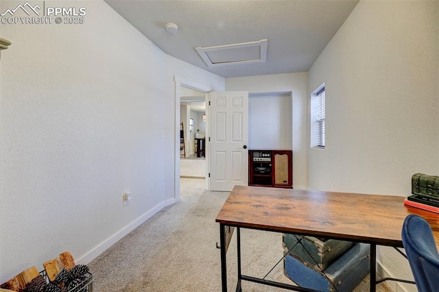 home office featuring light colored carpet