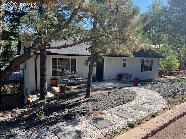 rear view of house featuring a patio area