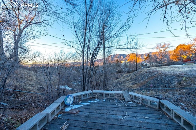 2841 Pinnacle Dr, Colorado Springs, CO 80910 - wooden deck with a mountain view
