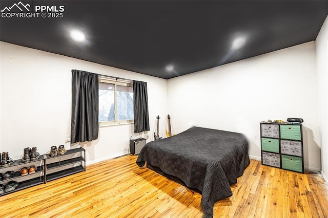 2841 Pinnacle Dr, Colorado Springs, CO 80910 - bedroom with wood-type flooring