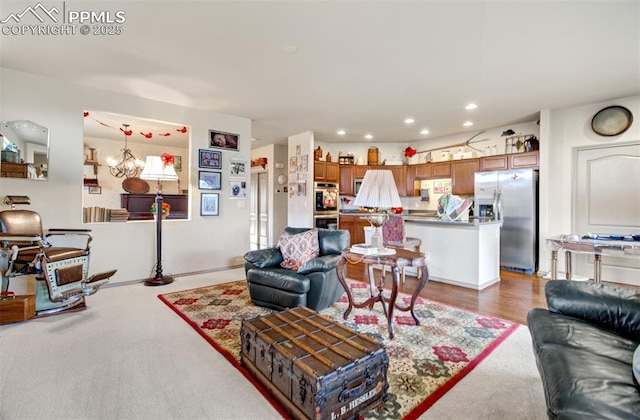 living room featuring an inviting chandelier