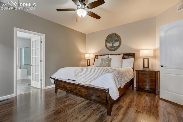 bedroom with ceiling fan, connected bathroom, and dark hardwood / wood-style floors