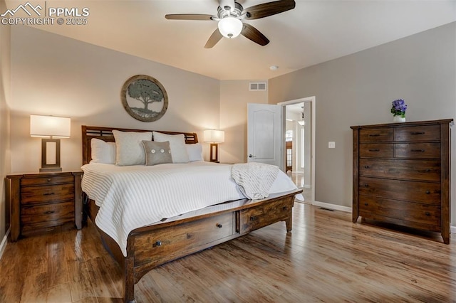 bedroom featuring ceiling fan and light hardwood / wood-style flooring