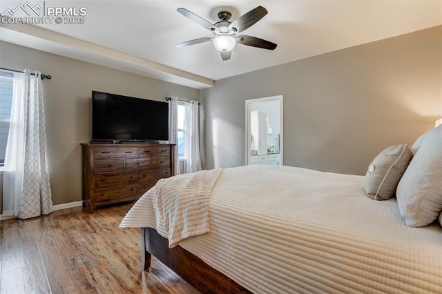 bedroom with ceiling fan and light hardwood / wood-style flooring