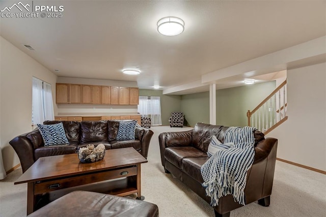 living room with light colored carpet