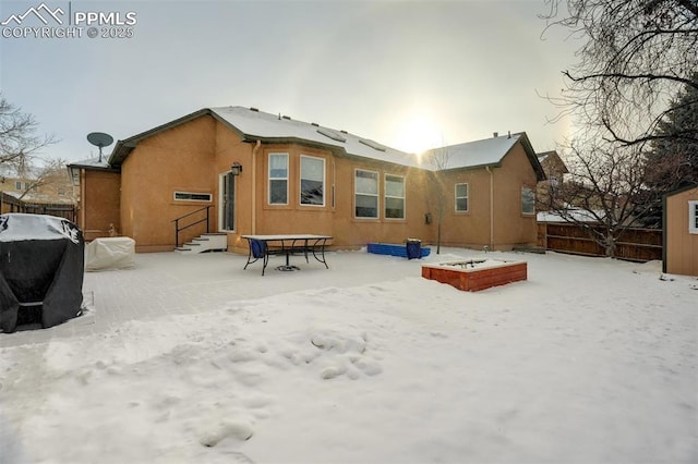 view of snow covered property